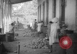 Image of shelling and drying of coconut Caracas Venezuela, 1940, second 44 stock footage video 65675050637