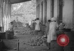 Image of shelling and drying of coconut Caracas Venezuela, 1940, second 46 stock footage video 65675050637