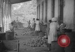 Image of shelling and drying of coconut Caracas Venezuela, 1940, second 48 stock footage video 65675050637
