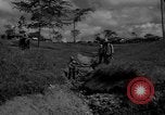 Image of man with container on his back Caracas Venezuela, 1940, second 4 stock footage video 65675050648