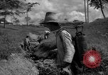 Image of man with container on his back Caracas Venezuela, 1940, second 16 stock footage video 65675050648