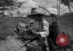 Image of man with container on his back Caracas Venezuela, 1940, second 17 stock footage video 65675050648