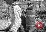 Image of man with container on his back Caracas Venezuela, 1940, second 24 stock footage video 65675050648