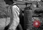 Image of man with container on his back Caracas Venezuela, 1940, second 25 stock footage video 65675050648