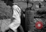 Image of man with container on his back Caracas Venezuela, 1940, second 26 stock footage video 65675050648