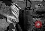 Image of man with container on his back Caracas Venezuela, 1940, second 27 stock footage video 65675050648