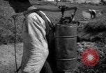 Image of man with container on his back Caracas Venezuela, 1940, second 28 stock footage video 65675050648