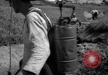Image of man with container on his back Caracas Venezuela, 1940, second 29 stock footage video 65675050648