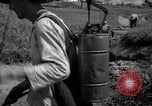 Image of man with container on his back Caracas Venezuela, 1940, second 30 stock footage video 65675050648