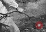 Image of man with container on his back Caracas Venezuela, 1940, second 36 stock footage video 65675050648