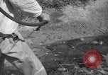 Image of man with container on his back Caracas Venezuela, 1940, second 38 stock footage video 65675050648
