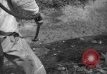 Image of man with container on his back Caracas Venezuela, 1940, second 40 stock footage video 65675050648