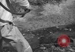 Image of man with container on his back Caracas Venezuela, 1940, second 43 stock footage video 65675050648