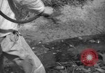 Image of man with container on his back Caracas Venezuela, 1940, second 44 stock footage video 65675050648