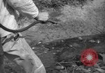 Image of man with container on his back Caracas Venezuela, 1940, second 49 stock footage video 65675050648