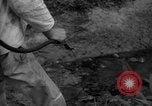Image of man with container on his back Caracas Venezuela, 1940, second 54 stock footage video 65675050648