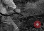 Image of man with container on his back Caracas Venezuela, 1940, second 56 stock footage video 65675050648