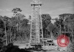 Image of oil derrick Caracas Venezuela, 1940, second 45 stock footage video 65675050651
