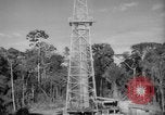 Image of oil derrick Caracas Venezuela, 1940, second 48 stock footage video 65675050651