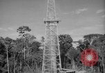 Image of oil derrick Caracas Venezuela, 1940, second 50 stock footage video 65675050651