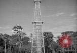 Image of oil derrick Caracas Venezuela, 1940, second 54 stock footage video 65675050651