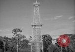 Image of oil derrick Caracas Venezuela, 1940, second 56 stock footage video 65675050651