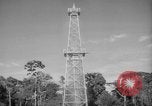 Image of oil derrick Caracas Venezuela, 1940, second 57 stock footage video 65675050651