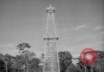 Image of oil derrick Caracas Venezuela, 1940, second 58 stock footage video 65675050651