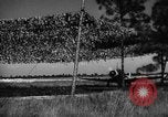 Image of camouflaged net United States USA, 1941, second 54 stock footage video 65675050731