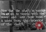 Image of coal mining and coal train underground United States USA, 1919, second 3 stock footage video 65675050759