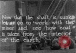 Image of coal mining and coal train underground United States USA, 1919, second 5 stock footage video 65675050759