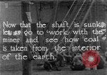 Image of coal mining and coal train underground United States USA, 1919, second 7 stock footage video 65675050759
