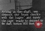 Image of coal mining and coal train underground United States USA, 1919, second 25 stock footage video 65675050759