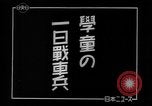 Image of Japanese high school boys train with soldiers Japan, 1942, second 3 stock footage video 65675050776