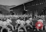 Image of Japanese high school boys train with soldiers Japan, 1942, second 28 stock footage video 65675050776