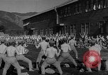 Image of Japanese high school boys train with soldiers Japan, 1942, second 34 stock footage video 65675050776