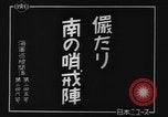 Image of Japanese teach semaphore signaling to Borneo natives Borneo, 1942, second 4 stock footage video 65675050779