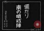 Image of Japanese teach semaphore signaling to Borneo natives Borneo, 1942, second 6 stock footage video 65675050779