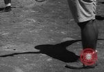 Image of Japanese teach semaphore signaling to Borneo natives Borneo, 1942, second 8 stock footage video 65675050779