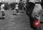 Image of Japanese teach semaphore signaling to Borneo natives Borneo, 1942, second 13 stock footage video 65675050779