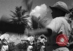 Image of Japanese teach semaphore signaling to Borneo natives Borneo, 1942, second 18 stock footage video 65675050779