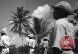 Image of Japanese teach semaphore signaling to Borneo natives Borneo, 1942, second 20 stock footage video 65675050779
