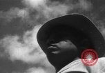 Image of Japanese teach semaphore signaling to Borneo natives Borneo, 1942, second 22 stock footage video 65675050779