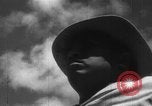 Image of Japanese teach semaphore signaling to Borneo natives Borneo, 1942, second 23 stock footage video 65675050779