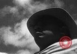 Image of Japanese teach semaphore signaling to Borneo natives Borneo, 1942, second 24 stock footage video 65675050779