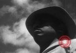 Image of Japanese teach semaphore signaling to Borneo natives Borneo, 1942, second 25 stock footage video 65675050779