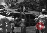 Image of Japanese teach semaphore signaling to Borneo natives Borneo, 1942, second 26 stock footage video 65675050779