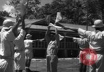 Image of Japanese teach semaphore signaling to Borneo natives Borneo, 1942, second 27 stock footage video 65675050779