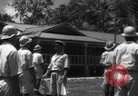 Image of Japanese teach semaphore signaling to Borneo natives Borneo, 1942, second 29 stock footage video 65675050779