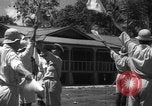 Image of Japanese teach semaphore signaling to Borneo natives Borneo, 1942, second 32 stock footage video 65675050779